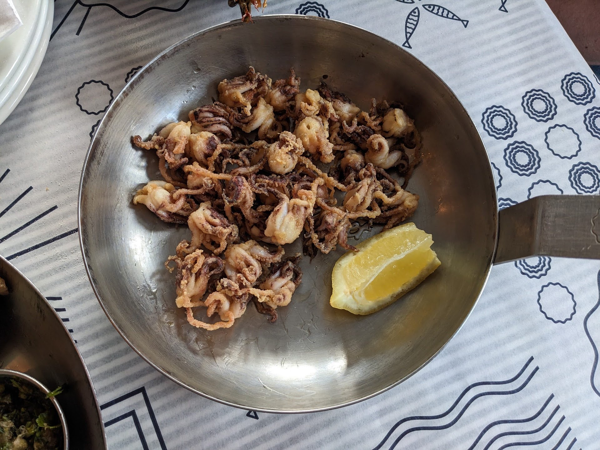 Deep fried squid heads in the UK